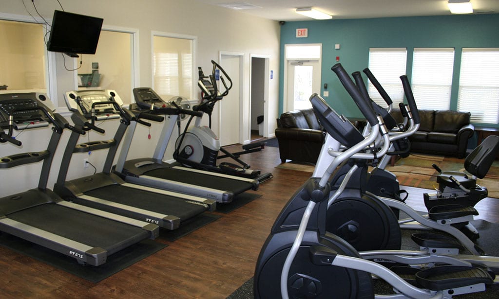 Fitness center at Remington Square apartment community in Lawrence